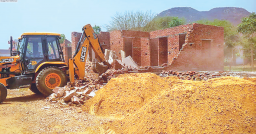 JDA demolishes three illegal colonies in Zone-10, frees up 18 bigha agri land